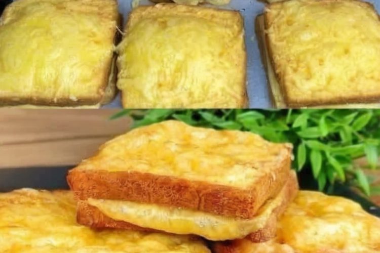 Air fryer grilled cheese sandwich cut in half with melted cheese