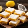Homemade lemon bars with buttery shortbread crust and powdered sugar